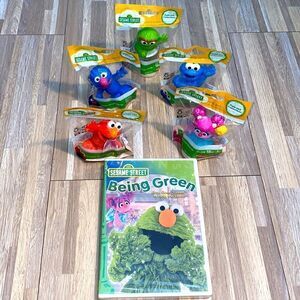 Sesame Street Elmo and friends toys and Elmo earth day dvd Easter basket figures